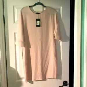 A brand new dress with a tag